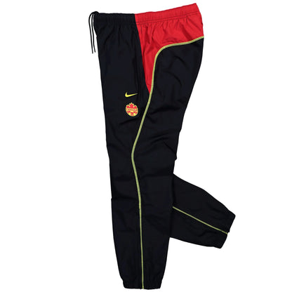 Nike Canada x NOCTA Woven Track Pants Black / Gym Red / Sonic Yellow